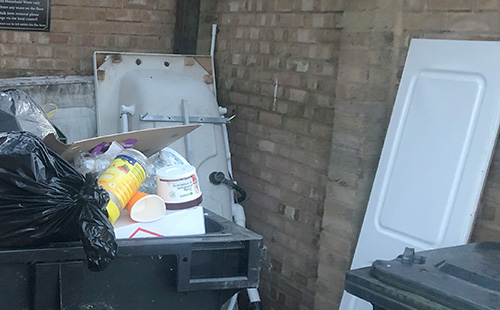 A bathtub and other household waste dumped illegally